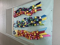 こ