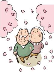 桜並木を散歩する夫婦