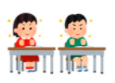 元気な男の子と女の子が並んで机に座っているイラスト