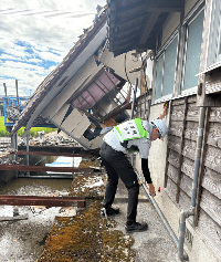 家屋被害調査写真1