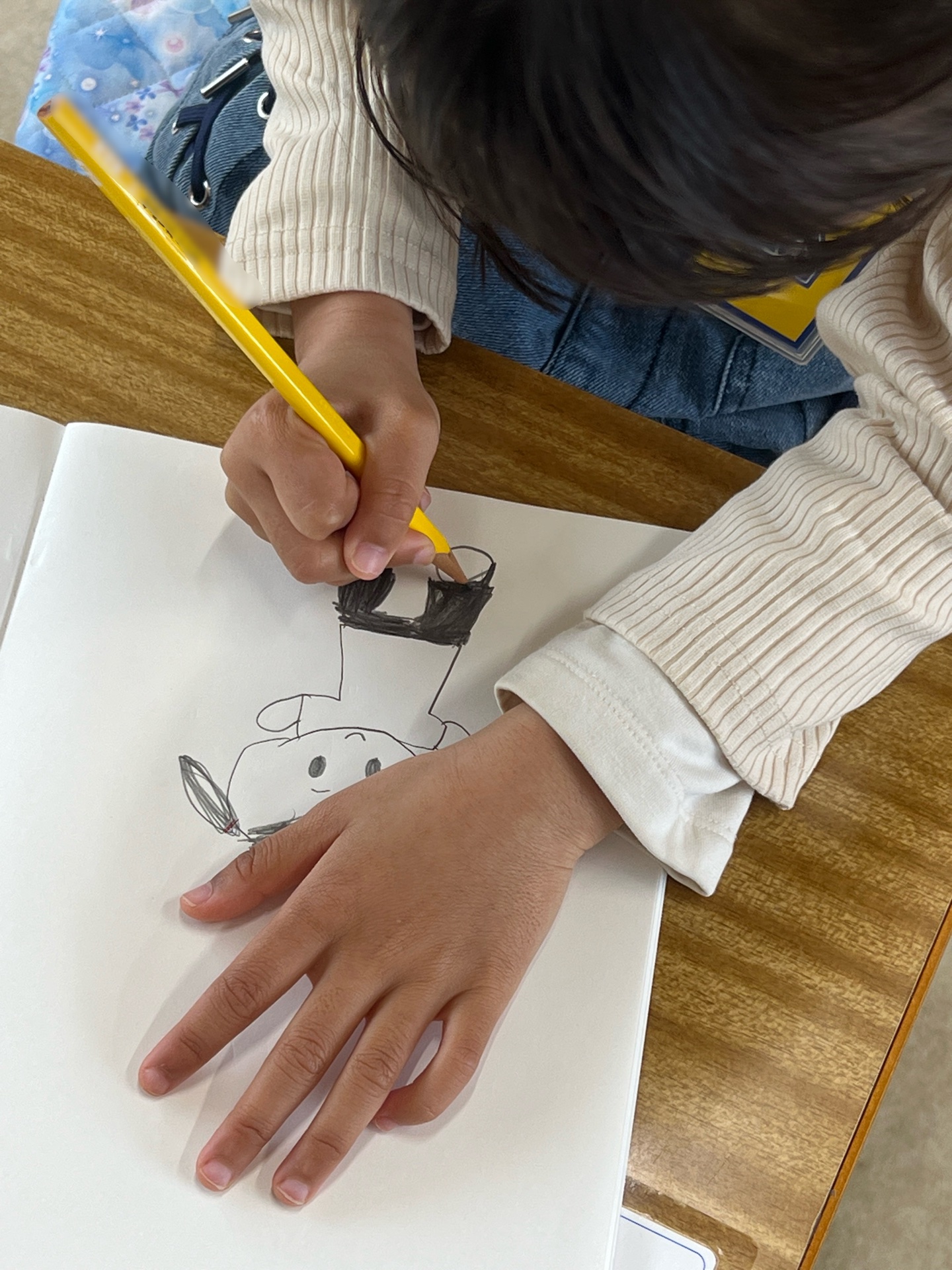 クラスの先生を描く